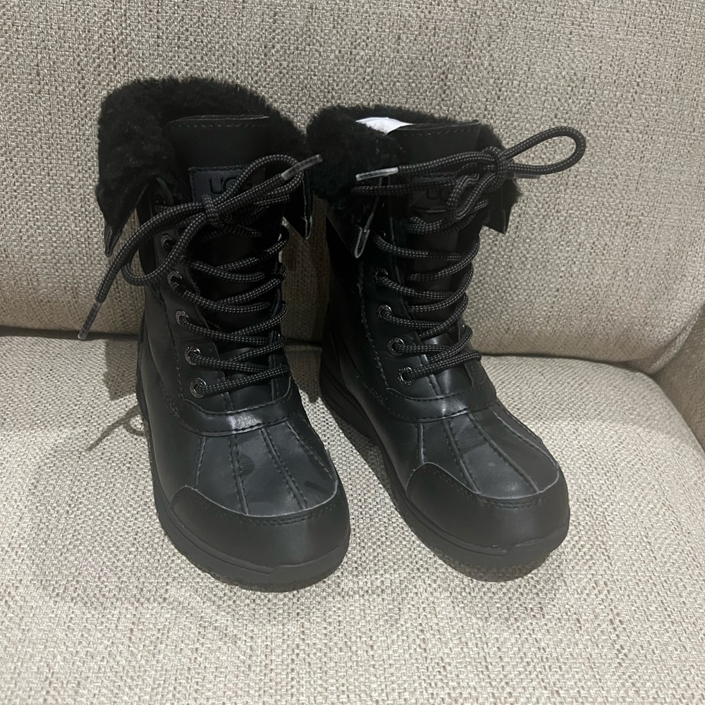 Unisex kids UGG boots.